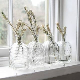 Stisnjena steklena vaza za steklenice
